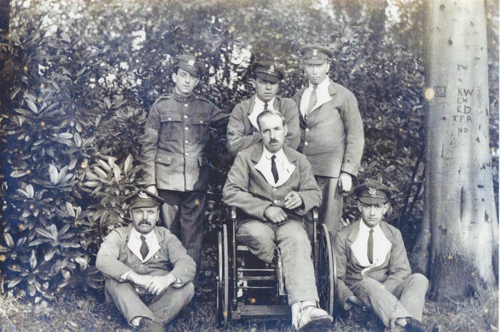 Neil Thomson recuperating. Note the caliper on his left leg
