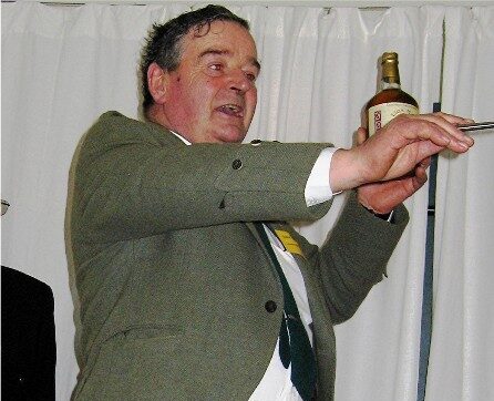 The Opening of the Heritage Centre 17 March 2007 John Livingstone auctioning the whisky