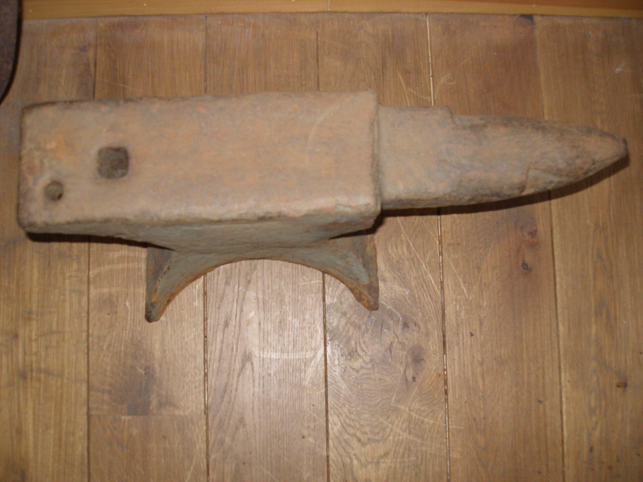 The Single Horn Anvil from the Clachan Smiddy. This anvil (height 31.5 cm, overall length of working surface including the horn 54.3 cm) is from the MacPherson smiddy at Clachan.