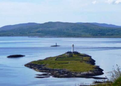 Lismore LIghthouse on Eilean Musdile with the Lady Rock beacon and Mull to the West