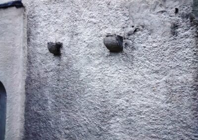 Original church roof supports on west wall